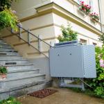 Outdoor lift at the entrance of a renovated old building