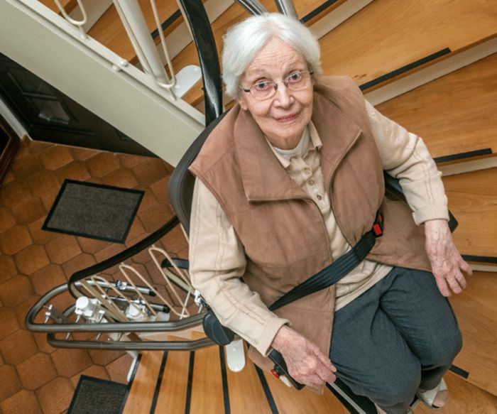 Woman on stairlift