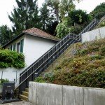 Wheelchair lift on steep staircase with three landings