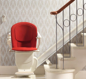 Stairlift with red upholstery