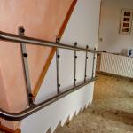 Stairlift rails on narrow staircase